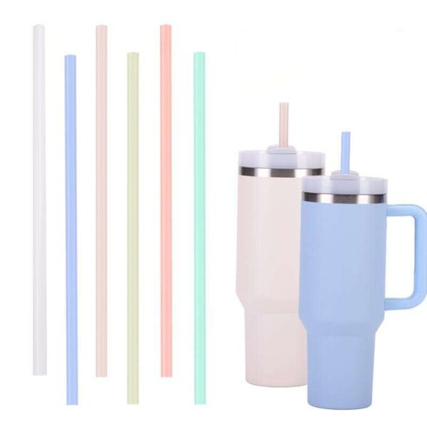 tumblers with colorful plastic straws