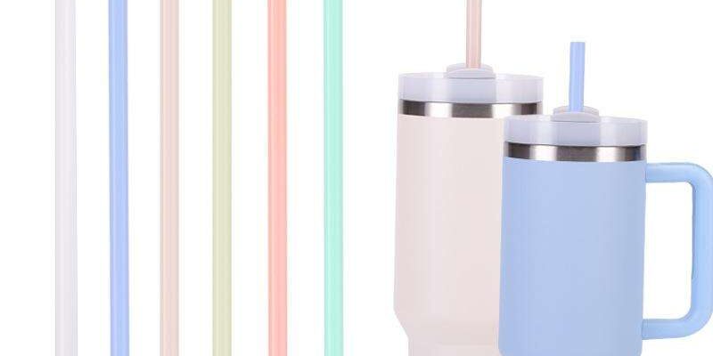 tumblers with colorful plastic straws